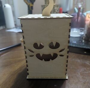 Wooden Box with Playful Face Cutout